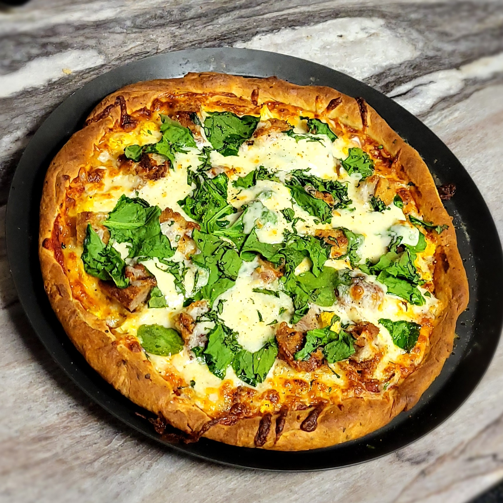 a picture of a spinach pizza